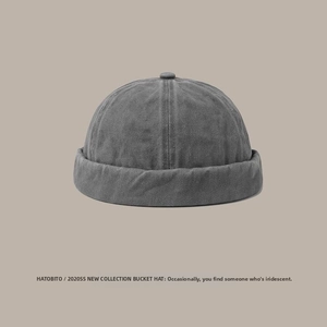 Detailed view of washed gray cotton miki hat with retro textures and turned-up brim