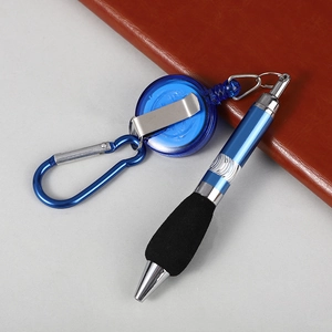 Blue retractable ballpoint pen with carabiner and soft grip for outdoor or office use