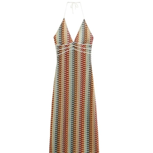 Bohemian knit maxi dress with V-neck, zigzag patterns, and colorful stripe details
