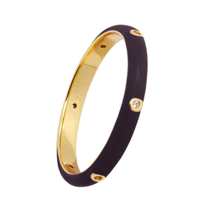 Detail view of purple enamel ring featuring white zircons and gold-plated inner band