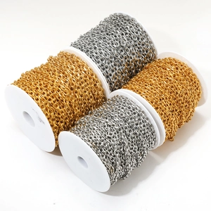 Golden and silver stainless steel cross chains on spools for DIY jewelry making