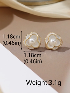 Detailed close-up showing S925 silver needle white camellia earrings with pearl center