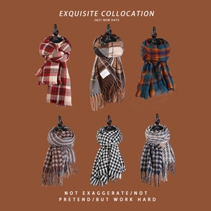 Cozy winter scarves in various plaid and houndstooth patterns with stylish fringe details