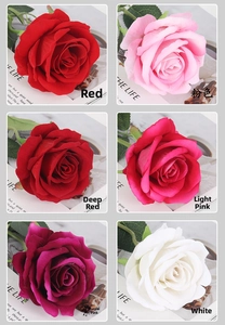 Detail view of artificial velvet roses in multiple colors for wedding and home decor