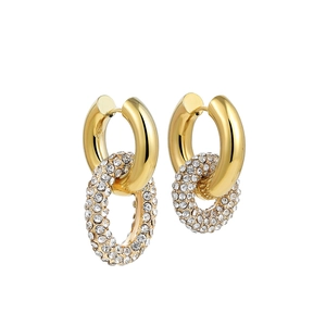 Detailed view of dual-loop oval 18K gold earrings with sparkling white zircon stones