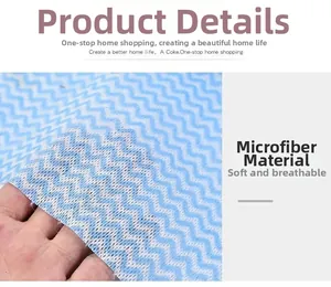 Close-up of blue wave pattern microfiber dishcloth showing breathable mesh texture