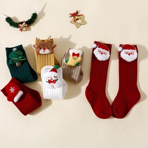 Christmas socks for kids and adults with 3D plush reindeer, Santa, and snowman designs
