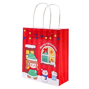 Red Christmas paper gift bag with white Merry Christmas text and festive illustration