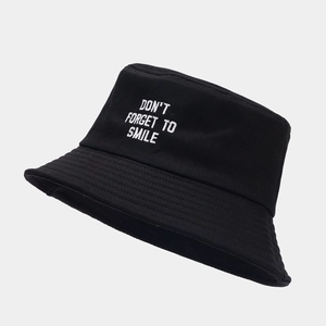 Classic black cotton bucket hat with white 'DON'T FORGET TO SMILE' letter embroidery