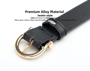 Detail of black leather belt featuring gold D-ring alloy buckle and fine stitching