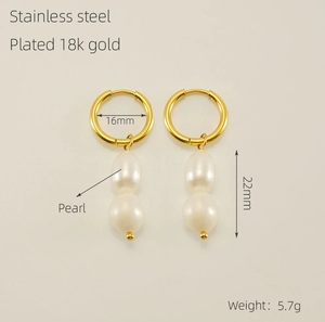 Detail view of 18k gold plated pearl earrings with dimensions: 16mm ring and 22mm pendant