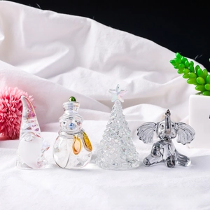 Iridescent crystal glass ornaments set featuring Christmas tree snowman and elephant figures