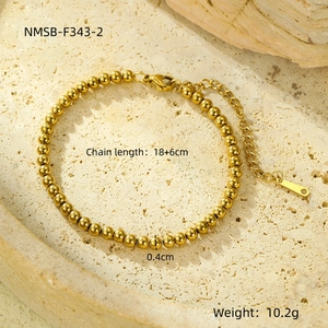 Detail showing 18K gold plated bead bracelet with dimensions 18+6cm and 0.4cm bead size