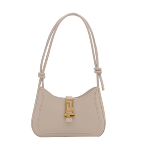 Chic beige crescent underarm bag with gold geometric buckle and knotted handle details
