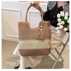 Three-tone gradient woven straw tote bag with decorative tassel and dual handles