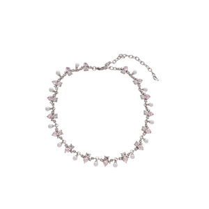 Silver necklace with pink pear-cut crystals and white pearls on white background