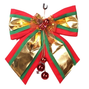 Festive Christmas bow ornament with pine cones, red berries and gold stars for holiday decor