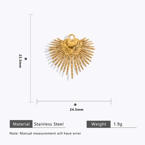 Macro detail of 18k gold plated heart pendant with sunray pattern and dimensions