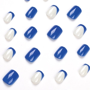 Short square press-on nails set featuring dark blue and white French tip designs