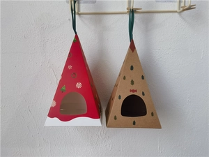 Pyramid Christmas gift boxes in red and kraft with clear windows and green ribbons