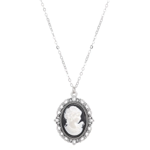 Vintage silver cameo pendant necklace featuring a classic female portrait relief on black background