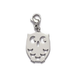 Detailed view of a silver owl-shaped pendant with a secure lobster clasp attachment