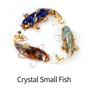 Three koi fish ornaments made of crystal stone resin with gold foil for desk decor