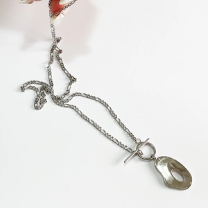 Minimalist 925 sterling silver Figaro chain necklace with geometric pendant and toggle clasp