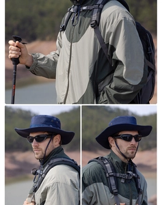 Detail of navy blue wide brim sun hat with windproof rope and matching outdoor gear