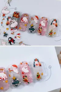 Detailed 5D Christmas nail stickers featuring rabbits, trees and snowflakes elements
