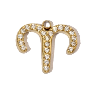 Detailed view of Aries zodiac charm with hand-set cubic zirconia in gold plating