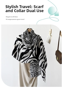 Detail of 90x90cm leopard and zebra print scarf showing silky texture and versatile use