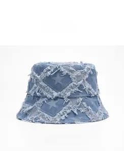 Detailed side view of denim bucket hat with frayed star patterns and distressed brim edges