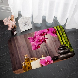 Alfombra de baño Zen detallada con orquídeas rosas, bambú verde y piedras negras