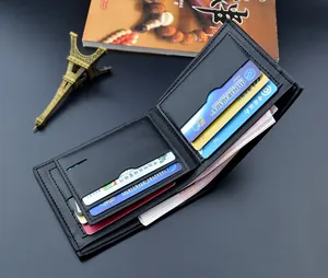 Detail view of black bi-fold leather wallet with multiple card slots and clear ID window