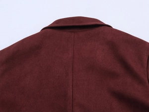 Detail view of burgundy faux suede jacket showing high-quality stitching and matte texture