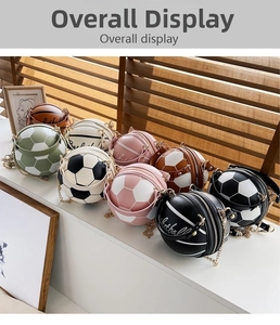 Close-up of basketball and soccer crossbody bags with metal chains and dual zippers