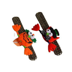 Halloween sequin slap bracelets with light-up pumpkin and red monster motifs for kids