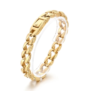Vintage 11mm gold-plated Cuban link bracelet with intricate engraved details and box clasp