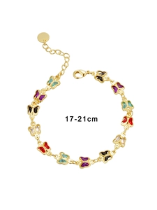 Detailed top view of a gold-plated butterfly bracelet with multi-color acrylic stones