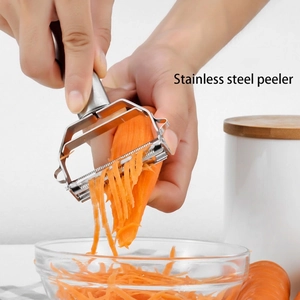 Dual-purpose stainless steel vegetable peeler and grater for efficient kitchen prep