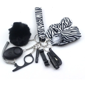 Zebra print 10-piece self defense keychain set with safety alarm and accessories