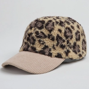 Autumn leopard print fleece baseball cap with beige corduroy brim shown from a 45-degree angle
