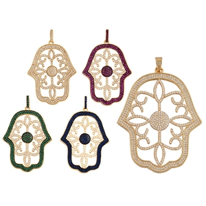 Micro-pave Hamsa Hand pendant with hollow design and colorful stones in four finishes