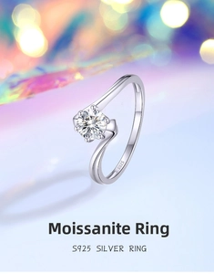 Macro detail of S925 silver moissanite ring showing 4-prong setting and curved band