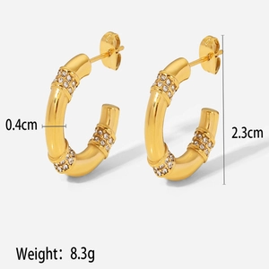 Bamboo style gold plated hoop earrings with crystals measuring 2.3cm height and 0.4cm width