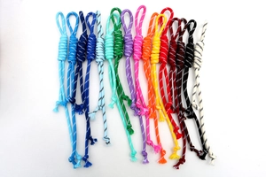 Close-up of 16 multicolor braided nylon lanyards for bags and zippers in a neat row