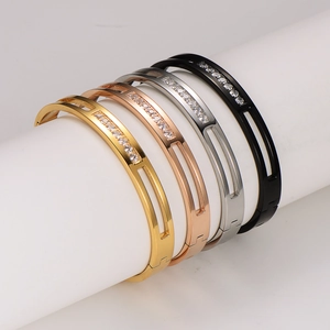 Polished stainless steel bangle set with double-row cutout design and zircon stones