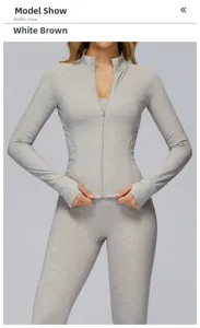 Detailed texture of white-brown marled fabric on tight-fit athletic jacket and pants