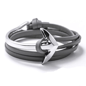 Detail showing a silver metal anchor hook with multi-layer grey braided leather cords